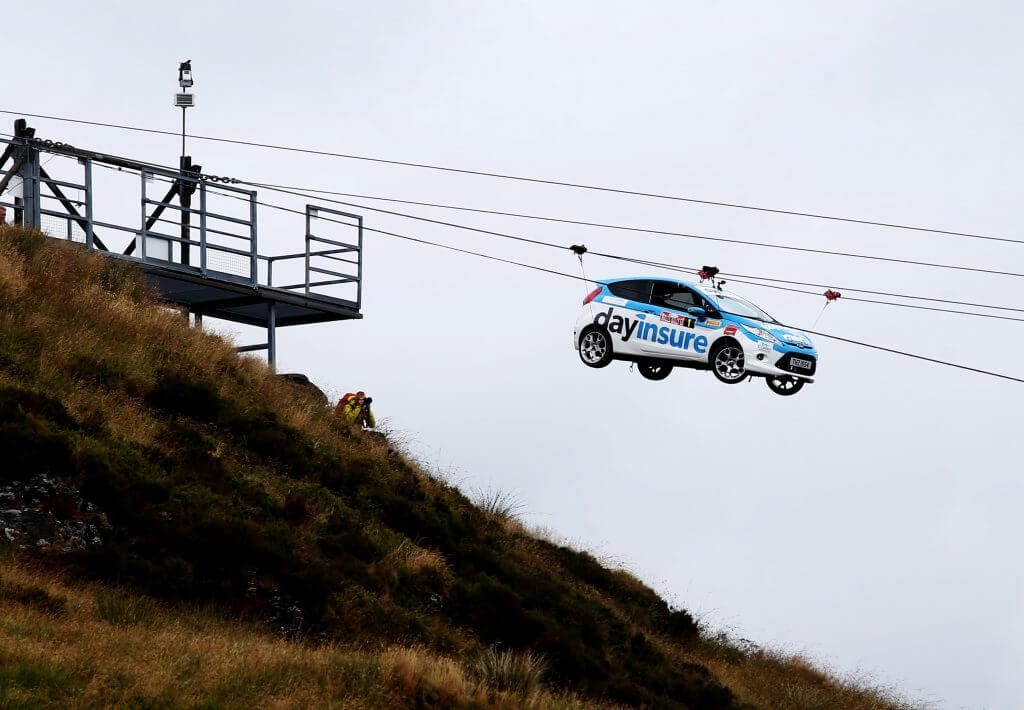 Dayinsure rally car on zipwire