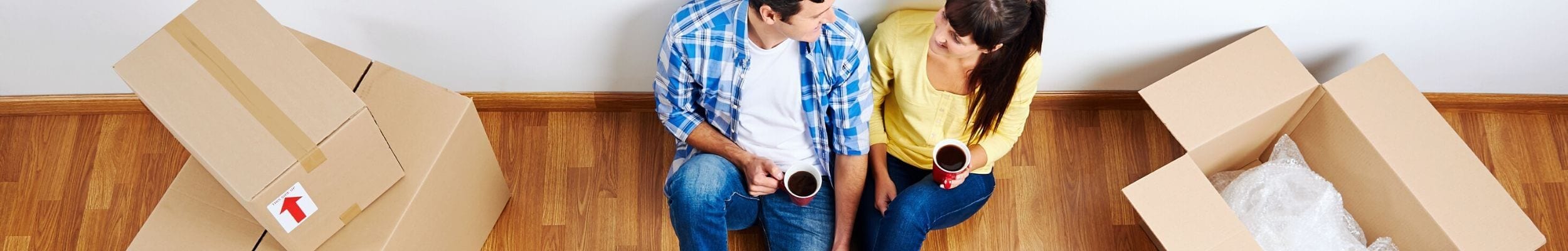 Young couple moving house - header