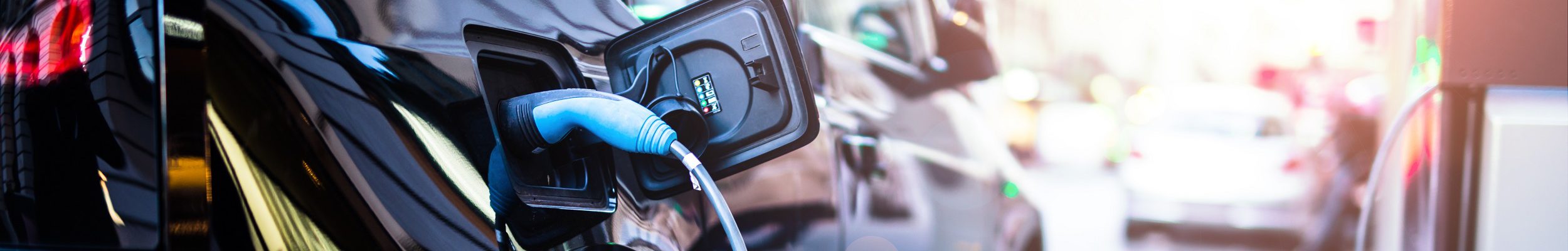 Electric car being charged