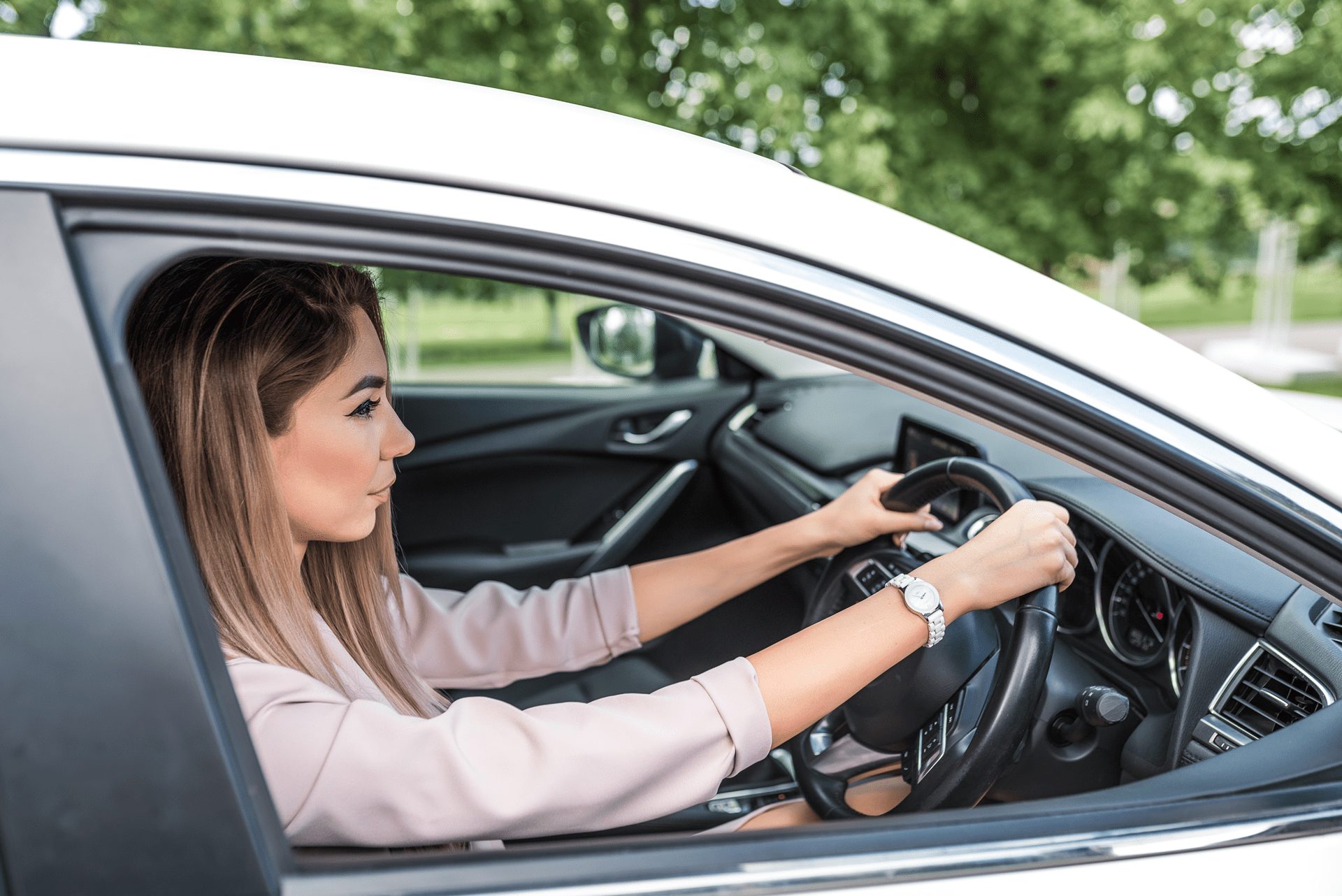 young woman driving a car