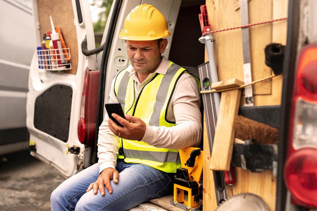 builder sat in van