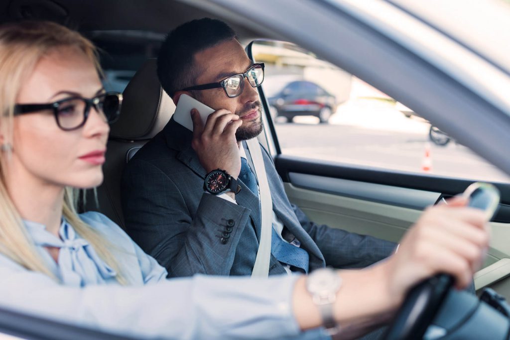business couple driving