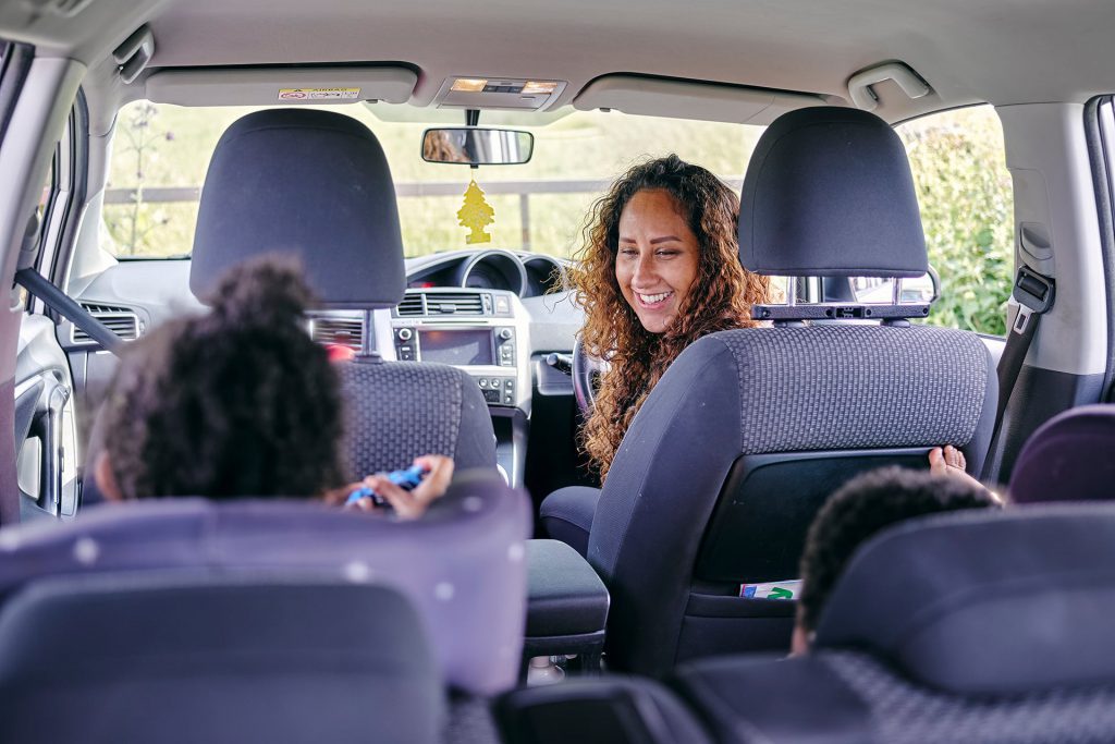 Mum and kids in car