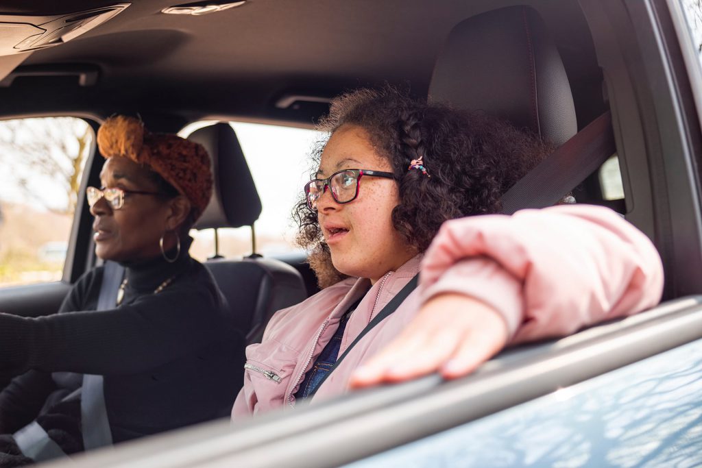 Mum and daughter in car