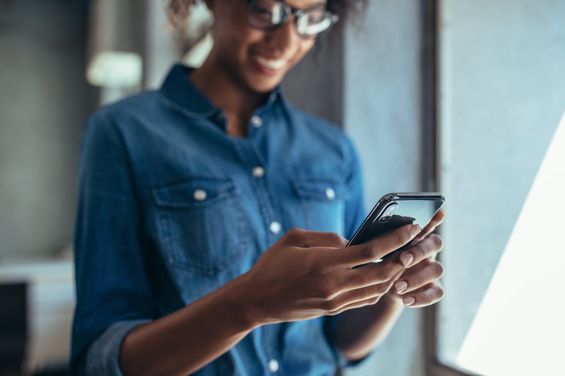woman with phone in hands