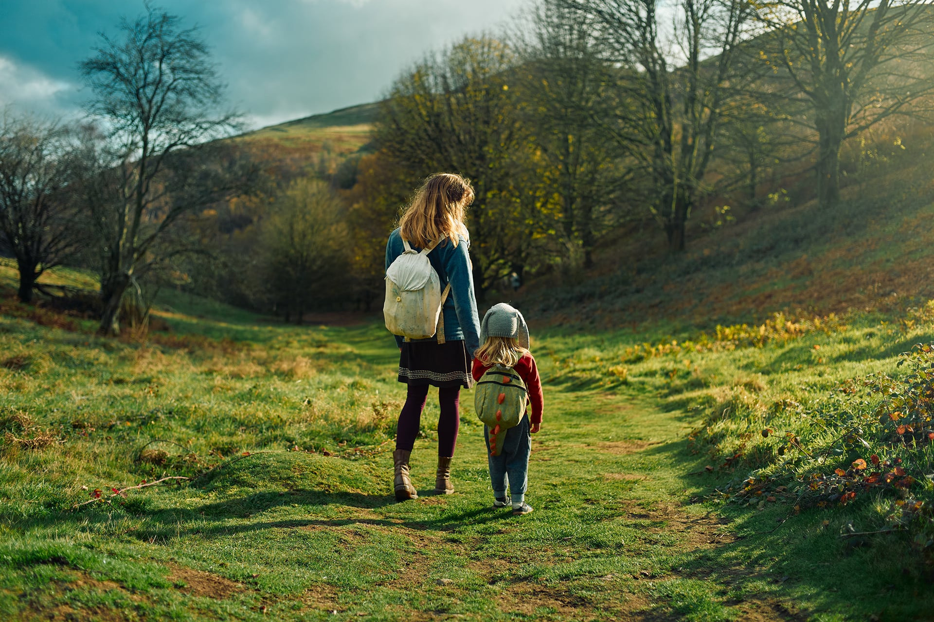 adult and child walking