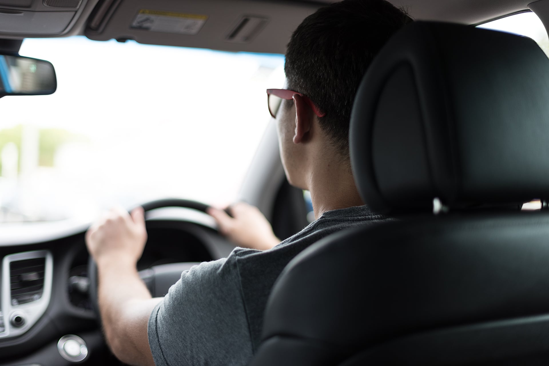 man driving a vehicle